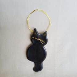 Laurel Pedersen hanging black cat